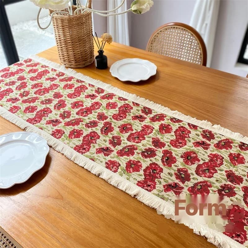 Bordløber i bomuldsblanding med blomstermotiv