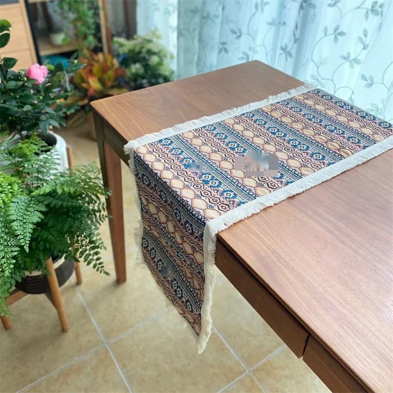 Bordløber i bomuld og polyester med bohemisk geometrisk mønster